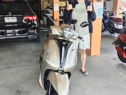Customer exploring Prachuap on rental bike